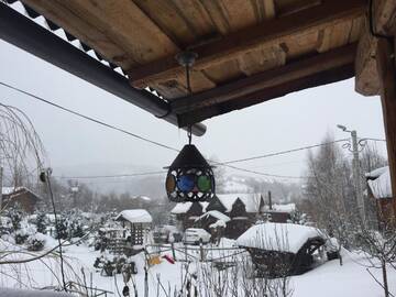 Фото номера Дом с 5 спальнями Дома для отпуска Cabana vânătorului г. Рышнов 27