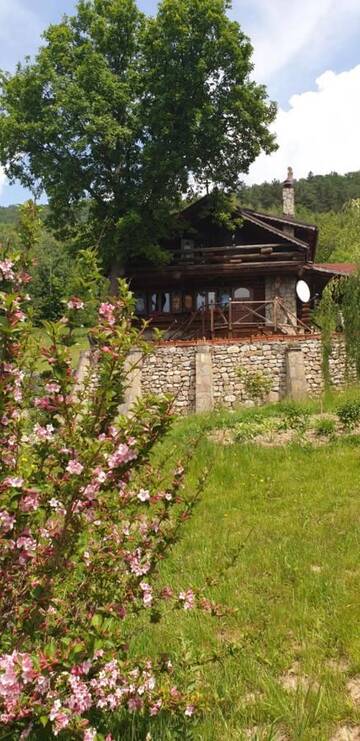 Фото номера Дом с 4 спальнями Дома для отпуска Cabana vânătorului г. Рышнов 12