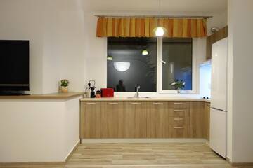 Фото номера Апартаменты - 1-й этаж Дома для отпуска Apartamente Bucegi г. Рышнов 4