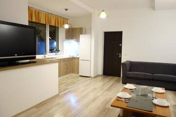 Фото номера Апартаменты - 1-й этаж Дома для отпуска Apartamente Bucegi г. Рышнов 12